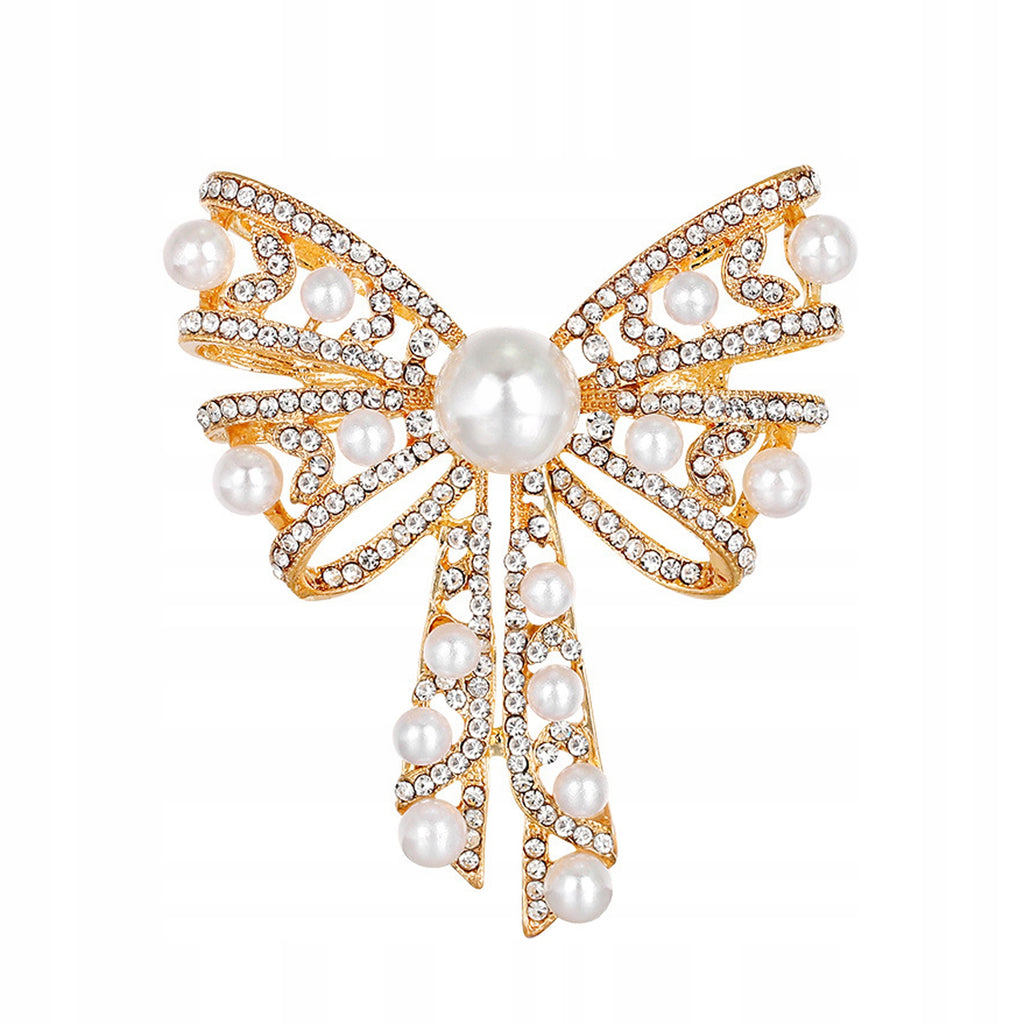 Large golden bow - brooch decorated with zircons and pearls