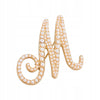 Golden letter M brooch with pearls
