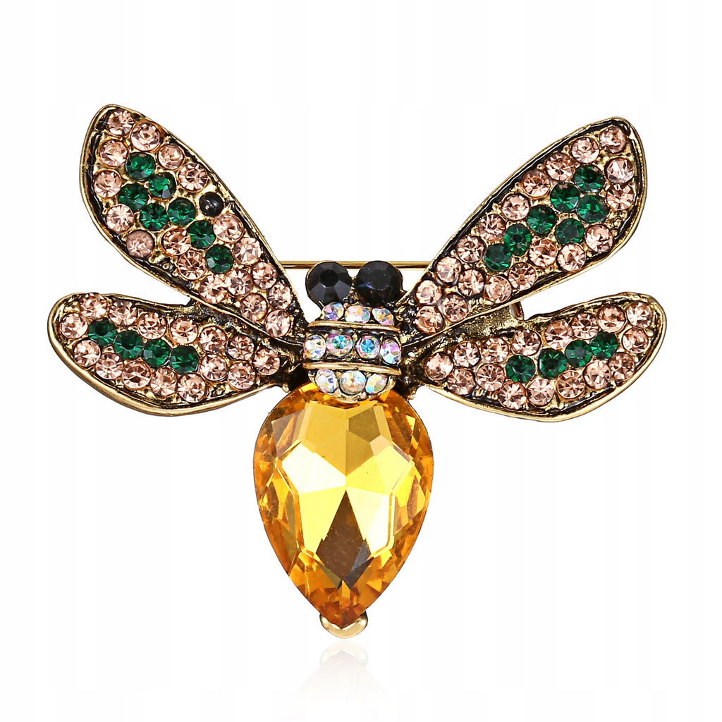 Yellow insect brooch with zircons