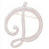 Golden letter D brooch with pearls