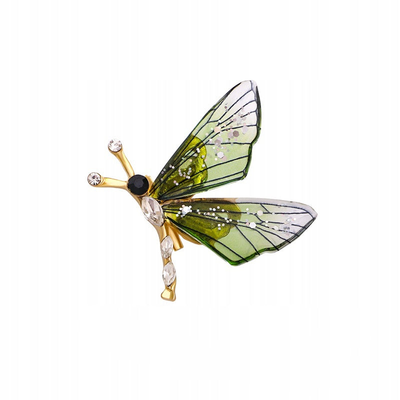 Small butterfly with green resin wings - a brooch
