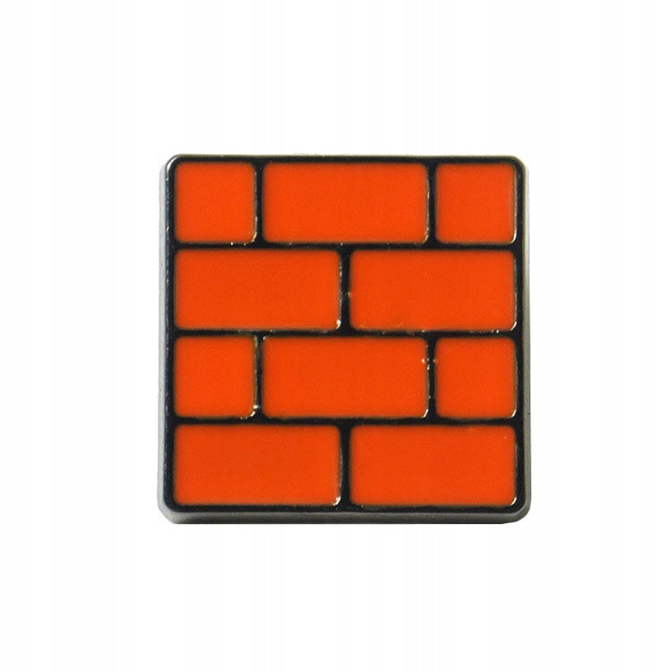 Brick from famous video game enamel pin