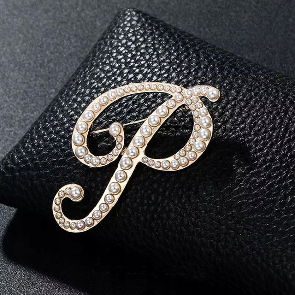 Letter P golden brooch with pearls