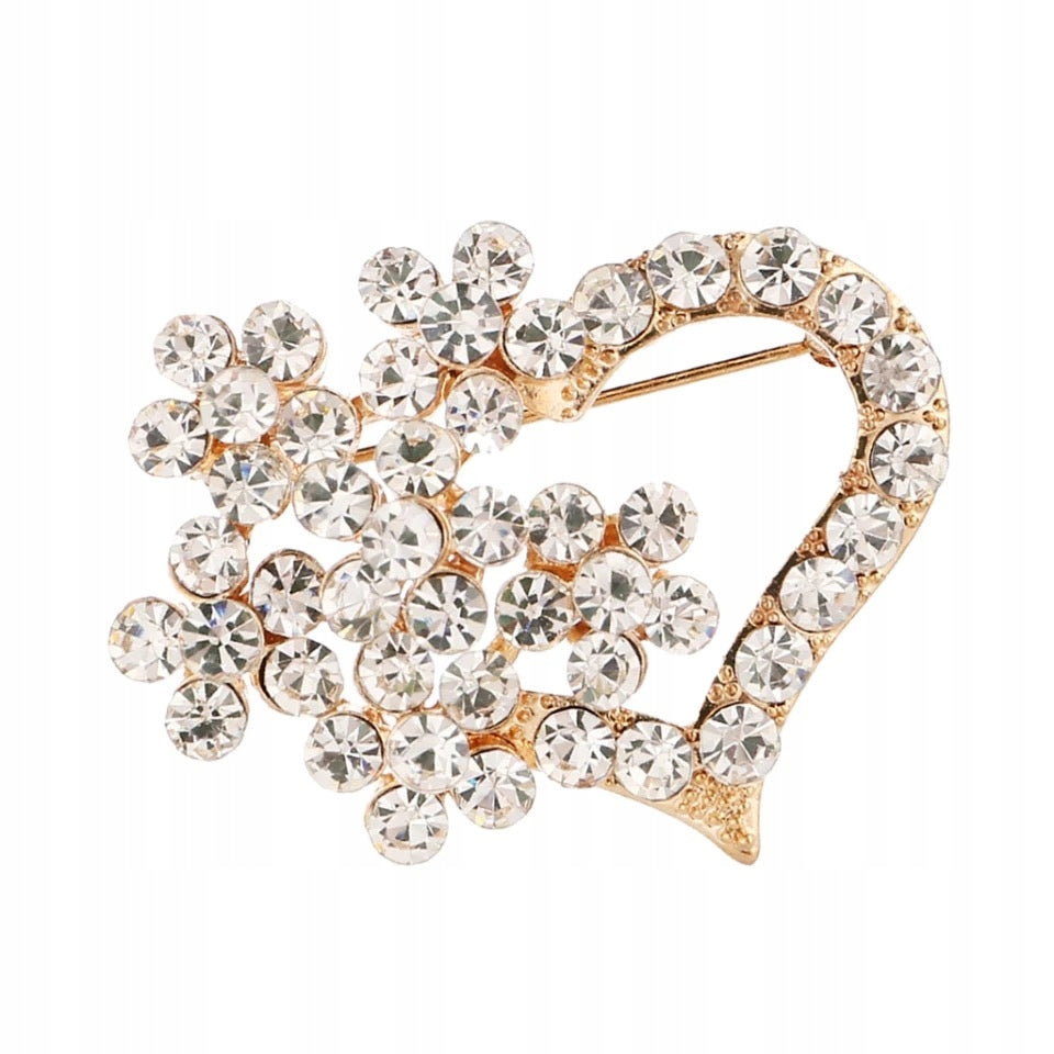 Golden heart with a flower brooch with zircons