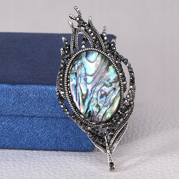 Peacock feather brooch nacre