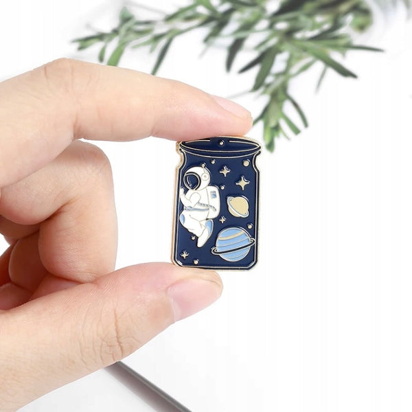 Astronaut and planets in the space jar enamel pin