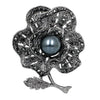 Flower brooch with pearl