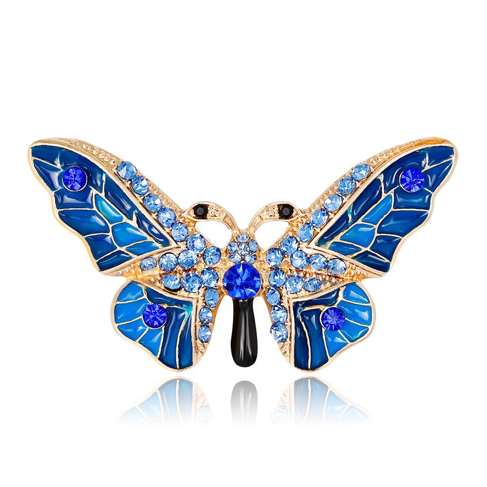 Blue butterfly brooch with zircons