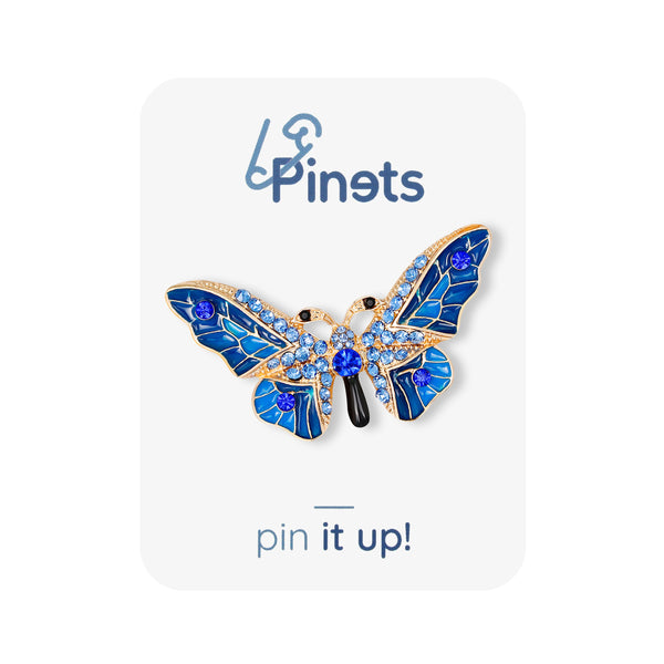 Blue butterfly brooch with zircons