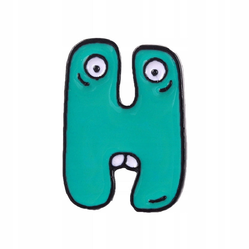 Letter H with eyes and teeth - green enamel pin
