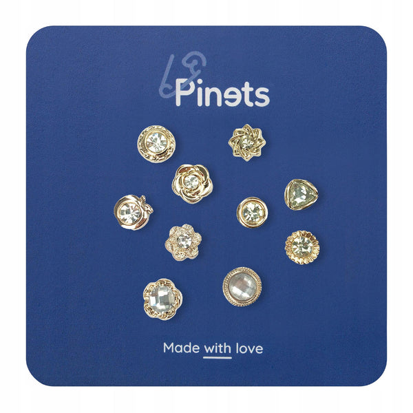 Set of 10 gold pins with cubic zirconia