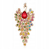 Peacock with cubic zirconia and a moving tail - a golden brooch