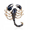Golden scorpion brooch