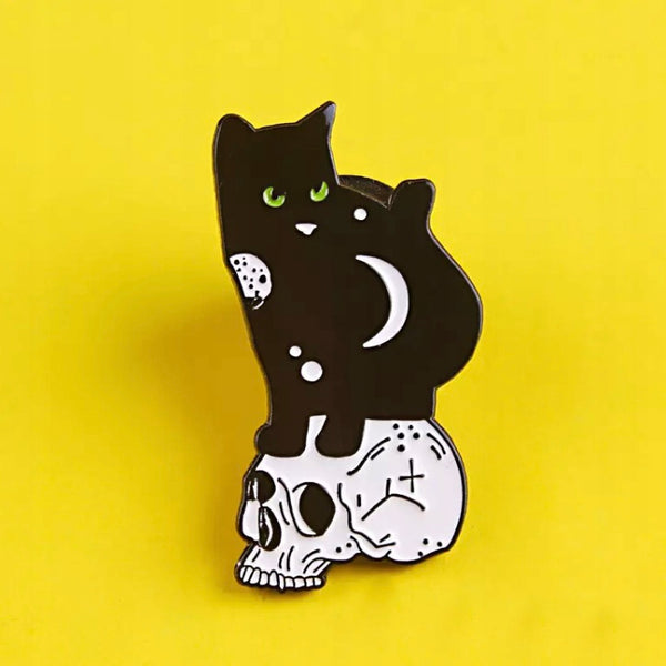 Lunar Cat standing on the skull enamel pin
