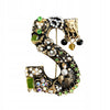 Letter S golden brooch with zircons