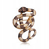 Golden snake brooch with zircons