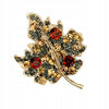 Golden leaf brooch with zircons