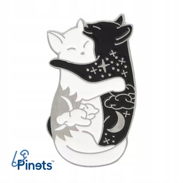 Cuddled cats day and night enamel pin